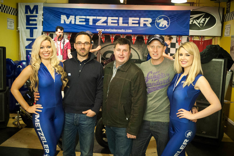 Brand Manager at Metzeler, Enrico D'Aloja with James Courtney, President of the Dundrod and District Motorcycle Club and road racer Gary Johnson.