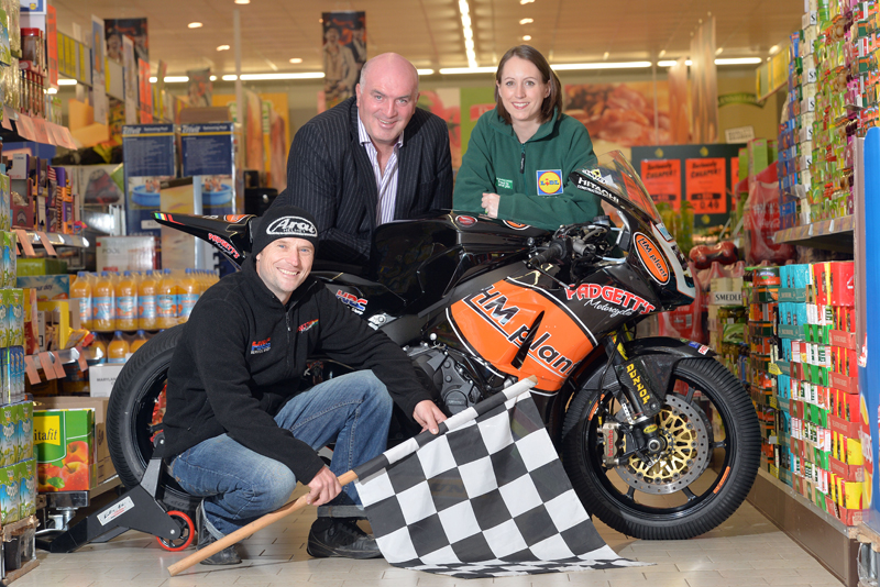 Bruce Anstey, Noel Johnston (Clerk of the Course) and Caitriona McCarry (Lidl NI)