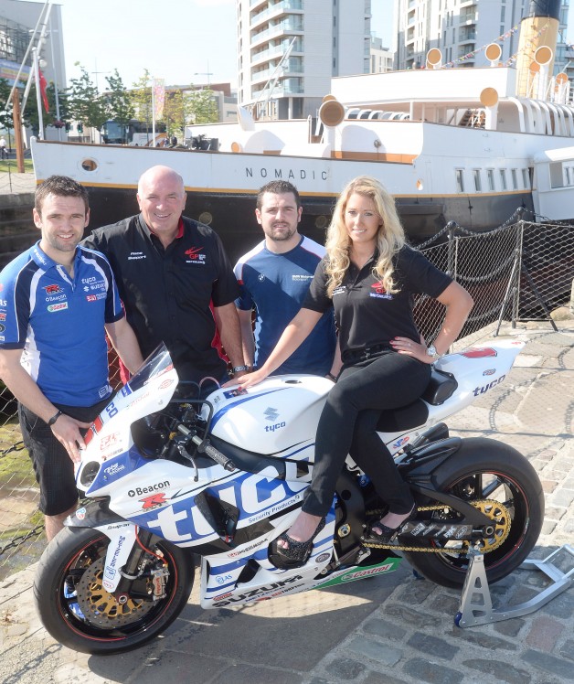 Some of the biggest names and brightest talents in real road racing have come together on board the SS Nomadic, Belfast to launch the 2014 Metzeler Ulster Grand Prix and give fans an exciting preview of this year’s event.  Pictured at the event is William and Michael Dunlop with Clerk of the Course Noel Johnston and UGP grid girl Sorrel Flack.