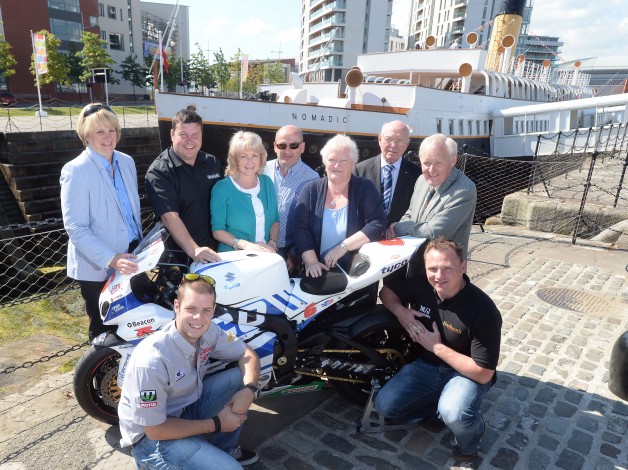 The team behind the rebuilding of Ulster Grand Prix House in memory of David Wood is urging bike fans to show their support by ‘buying a block’ for the building. Pictured at the 2014 Metzeler Ulster Grand Prix launch are (from left to right): Gail Bailie, James Courtney, Lee Wood of the David Wood Foundation, Paul McGovern, Valerie Miskimmon MBE, Bertie Bradford and Des Stewart, Chairman of the Ulster Grand Prix Supporters Club with road racers Jamie Hamilton and Stephen Thompson.