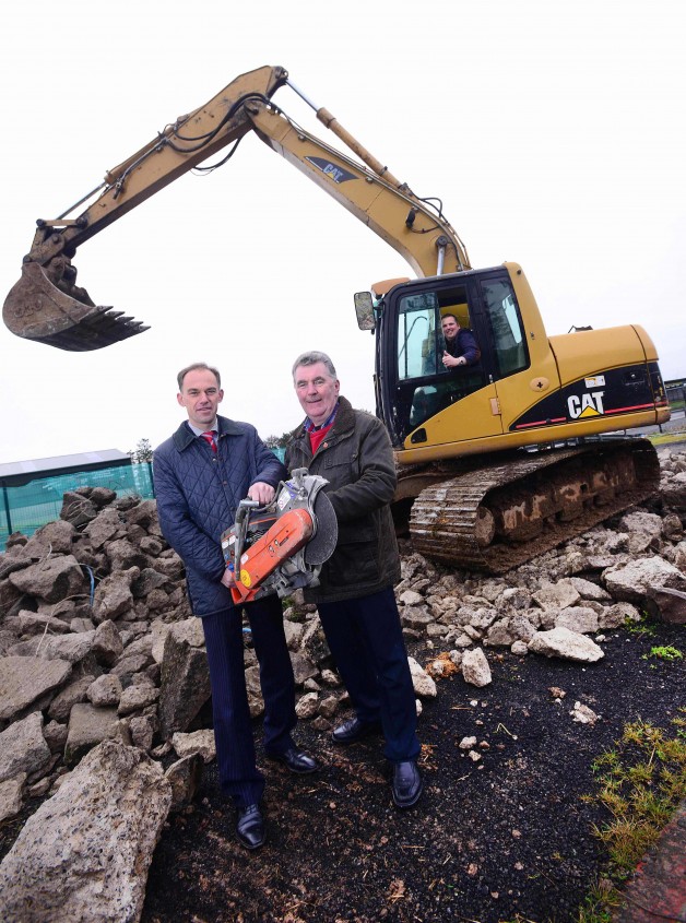 The Dundrod & District Motorcycle Club (DDMC) has announced that construction work has officially begun on the new ‘David Wood Ulster Grand Prix House’ in the paddock at Dundrod, named after the well known road racer and team manager.    In a ceremony on Tuesday, 16th December, first ground was broken on the project that is to become the future home for the Ulster Grand Prix race office and will also be used for meeting rooms and commentator posts.  Pictured (l-r): Warren Bell, representing the Alpha Programme ,Robert Graham, Chairman of Dundrod & District Motorcycle Club and The Mayor of Lisburn City Council, Councillor Andrew Ewing.